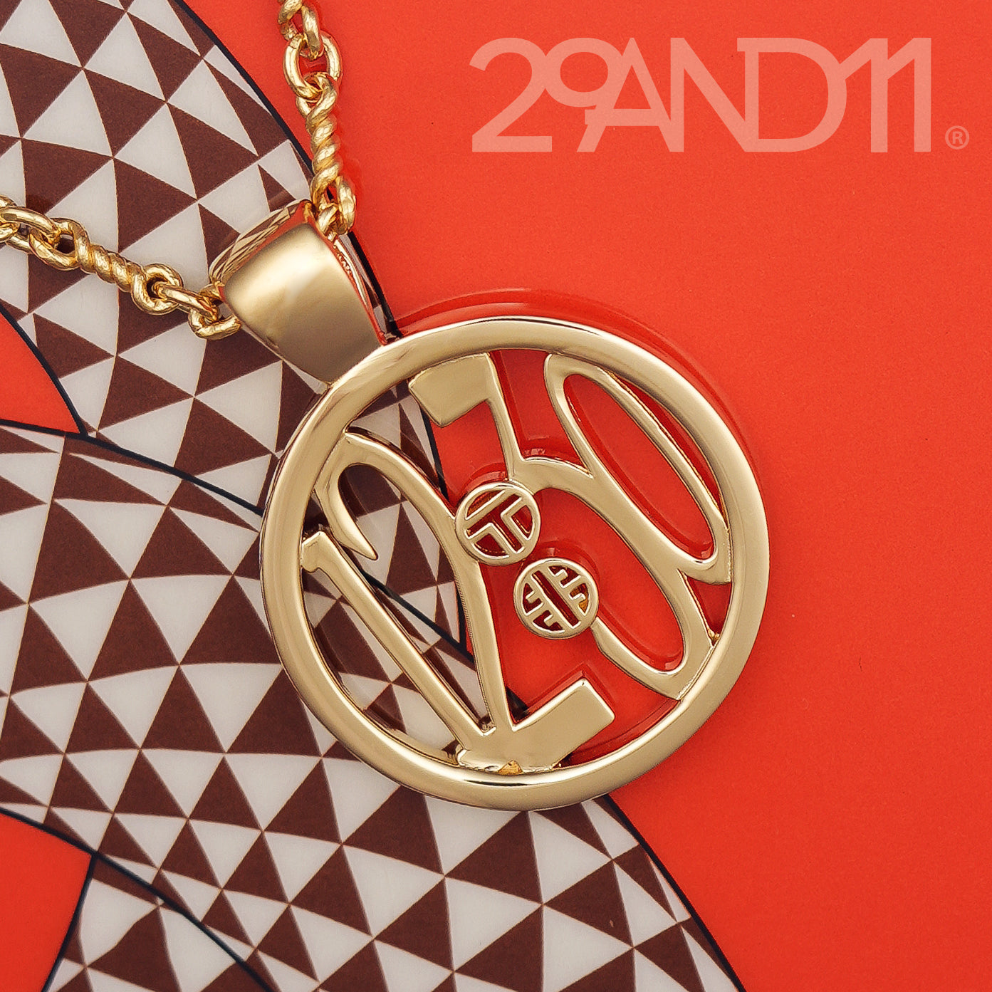 The Ashe is our monogram pendant inspired by our beloved monograms that grace all the thing we love and use daily. The numbers 12 and 30 are stretched vertically to the edges of the pendant.&nbsp; The numbers 12 and 30 are separated by a colon which is represented by our logo. Down the vertical side of the pendant the chapter name 'Mark' is inscribed on the monogram pendant.