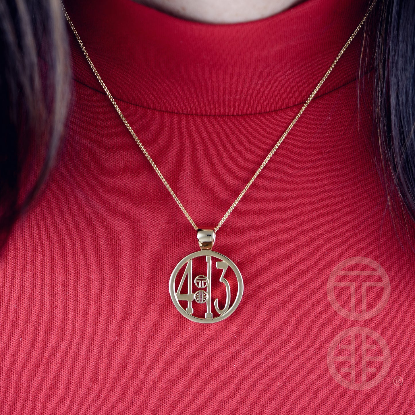 The Ashe is our monogram pendant inspired by our beloved monograms that grace all the thing we love and use daily. The numbers 4 and 13 are stretched vertically to the edges of the pendant. The numbers 4 and 13 are separated by a colon which is represented by our logo. Down the vertical side of the pendant the chapter name 'Philippians' is inscribed on the monogram pendant.