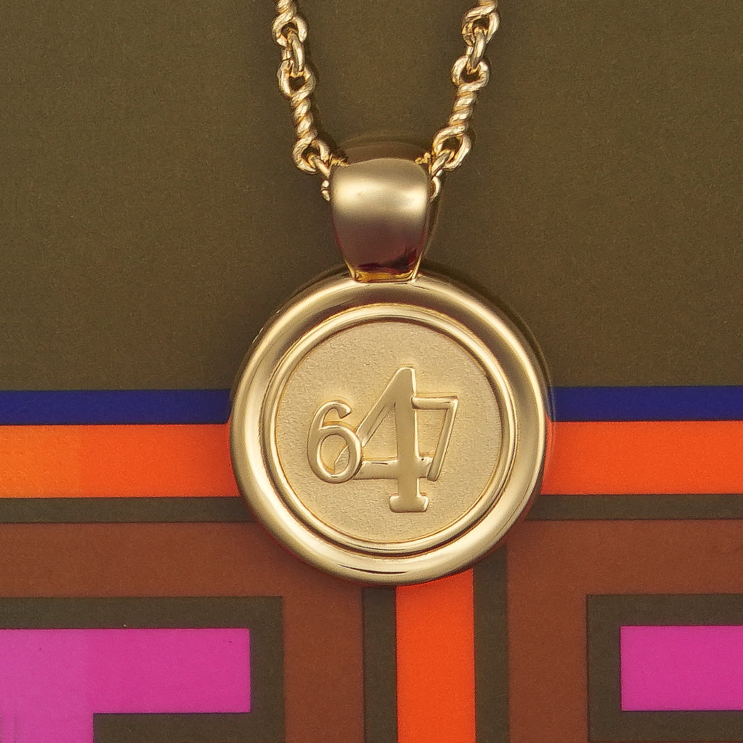 The WYIT is our first reversible pendant. One side of the medallion has the number 4 in the center of the pendant with the numbers 6 and 7 on each side.&nbsp; The other side of the pendant has a raised two tier cross. Down the vertical side of the pendant the chapter name Philippians is inscribed on the medallion.